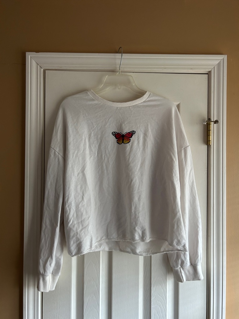 White Sweatshirt with Red-Orange Butterfly Embroidery